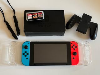 Nintendo Switch Azul y Rojo en perfecto estado.