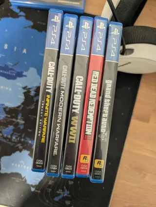 Pack Consola PS5 lector + mando palancas + juegos