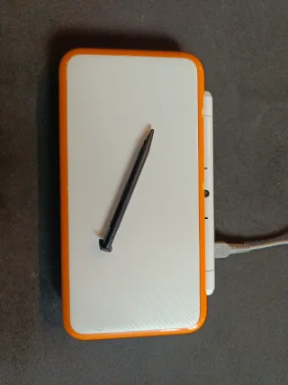 Nintendo 2DS XL Blanca/Naranja + Juegos