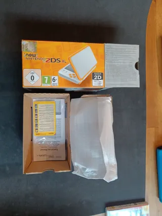 Nintendo 2DS XL Blanca/Naranja + Juegos