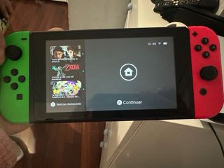 Nintendo Switch + 8 películas (sin cargador)