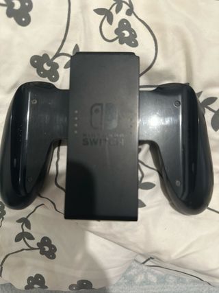 Nintendo Switch + 8 películas (sin cargador)