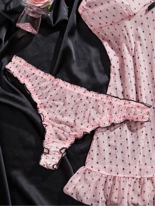 Conjunto lencería lunares rosa y negro