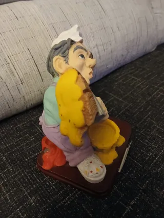 Figura pintor con brocha y cubo