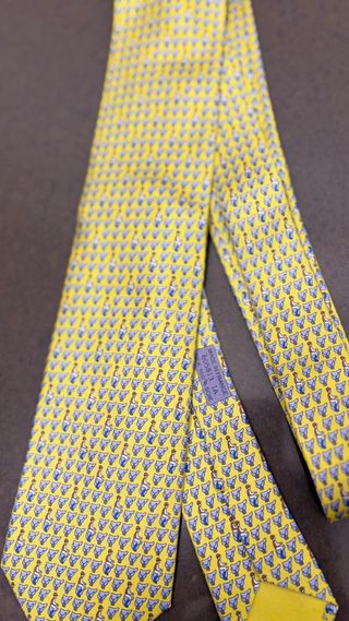 Cravatta Hermès seta giallo con fantini in sella
