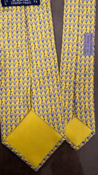 Cravatta Hermès seta giallo con fantini in sella
