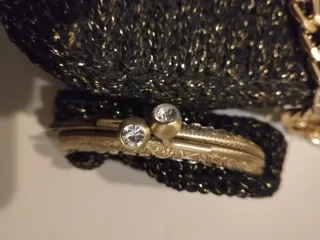 Borsetta con borsellino glitter nero/dorato