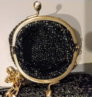 Borsetta con borsellino glitter nero/dorato