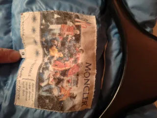 Piumino Moncler turchese