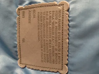 Piumino Moncler turchese