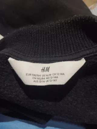 Chaqueta bomber negra y blanca