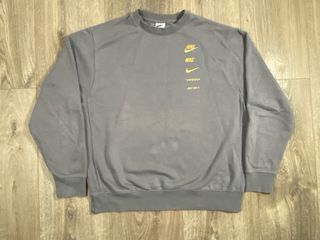 Sudadera Nike Gris Multilogo Dorado