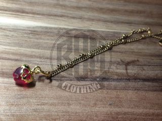 Collana con ciondolo a forma di teschio