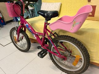 Bicicleta niña rosa con cesta y asiento trasero