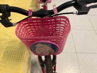 Bicicleta niña rosa con cesta y asiento trasero