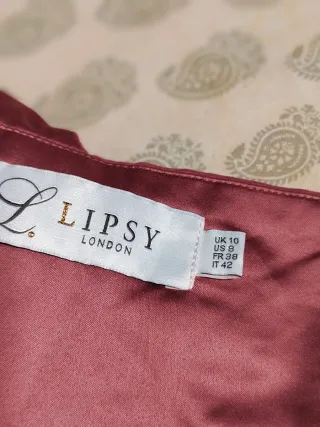 Vestido corto ceñido rosa y dorado