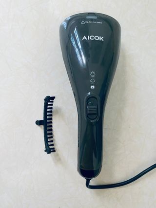 Spazzola a vapore per abiti