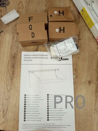 Toldo automático con brazo articulado