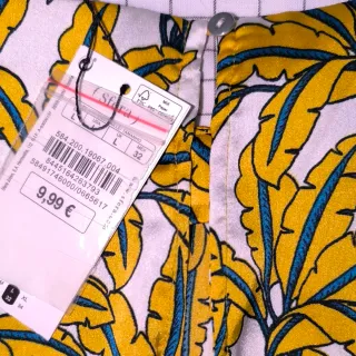 Top estampado hojas tropicales