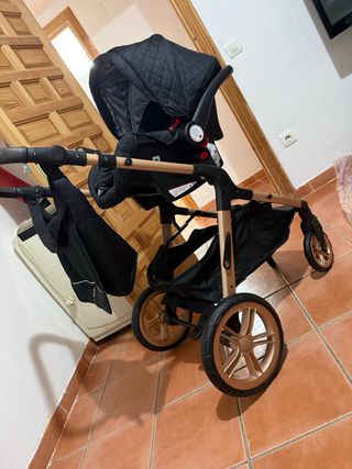 Carro de bebé 3 en 1 negro y dorado