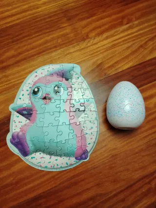 Puzzle infantil de huevo y criatura