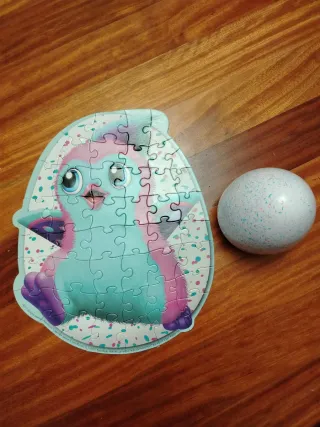 Puzzle infantil de huevo y criatura