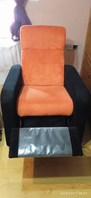 Poltrona relax manuale auricolare arancione e nero