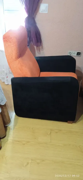 Poltrona relax manuale auricolare arancione e nero