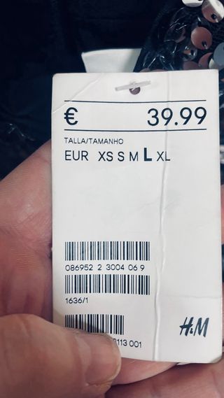 Blusa lentejuelas negra y plateada