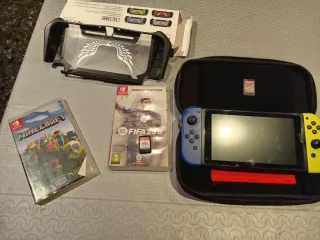 Nintendo Switch Azul/Amarillo + Juegos