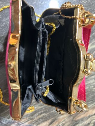 Bolso de fiesta fucsia y dorado