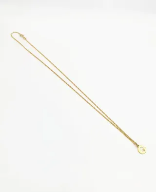 Conjunto de cadena y colgante letra “G” en Oro 18k