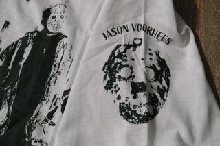 Camiseta Freddy vs Jason M Branca