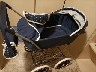 Cochecito de muñecas plegable