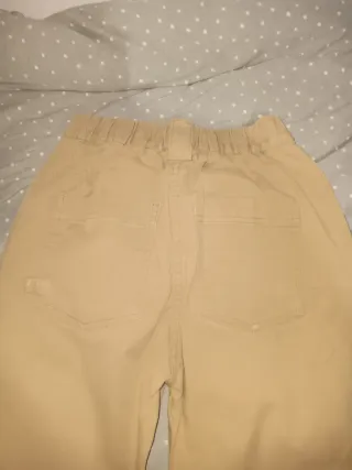 Pantalones beige anchos