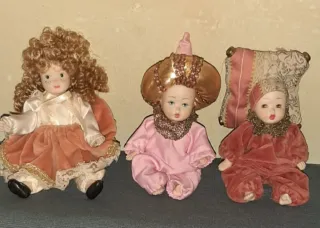 Tre bambole piccole di porcellana 10 euro