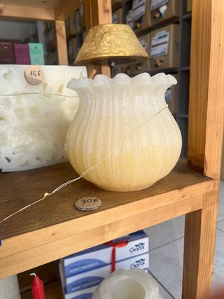 Vela de cera con forma de flor