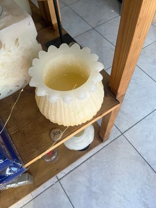Vela de cera con forma de flor