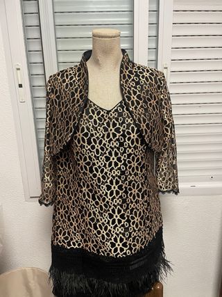 Vestido negro y dorado con torera