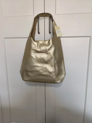 Bolso señora tipo jobo dorado