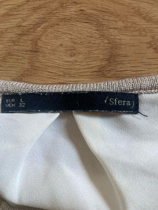 Jersey dorado con brillos y blanco