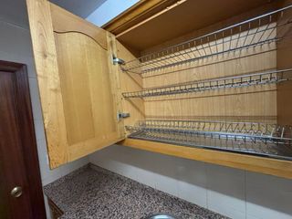 Muebles de cocina de madera y piedra