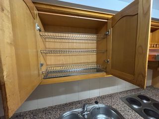 Muebles de cocina de madera y piedra