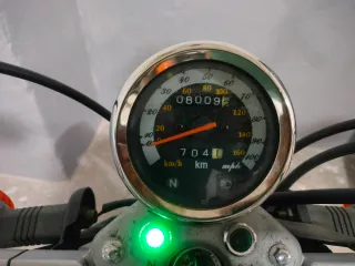 Moto custom naranja y plata.marca clipic guepardo