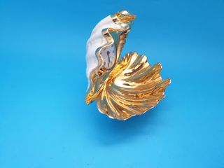 orologio a conchiglia vintage. Misure 21x23 cm.