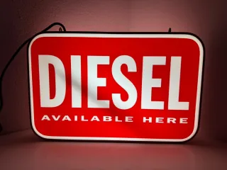 Insegna luminosa pubblicitaria DIESEL