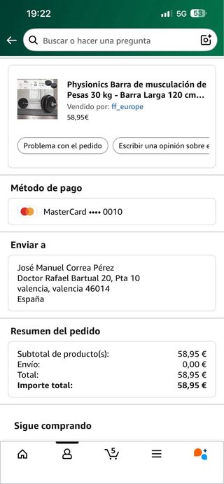 Banco de pesas y máquina de gimnasio