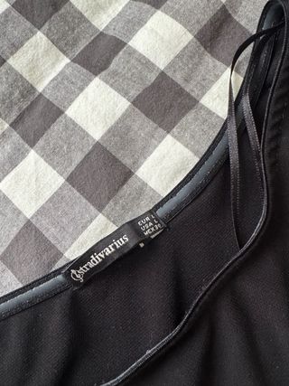 Body asimétrico manga larga negro