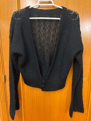 Torera negra de punto calado