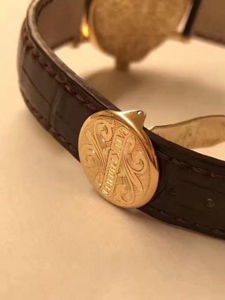 Reloj Patek Philippe Oro y Marrón